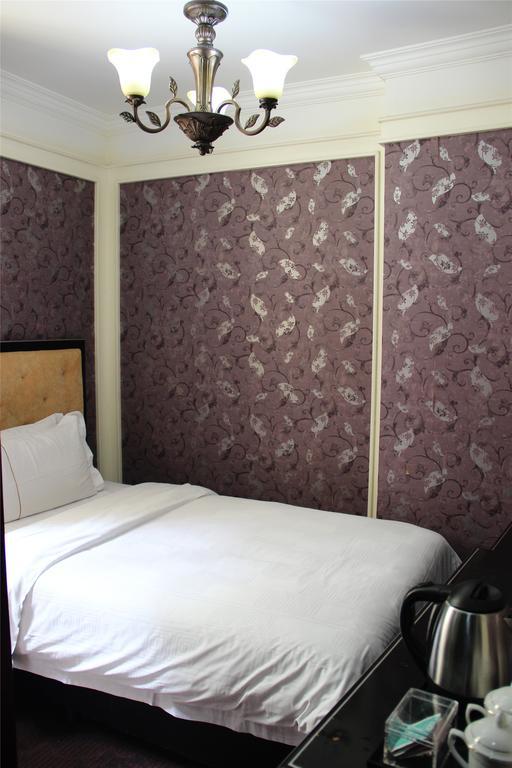 Manhattan Jinling Hotel Shanghái Habitación foto