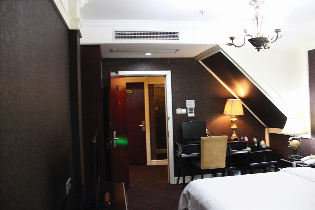 Manhattan Jinling Hotel Shanghái Habitación foto