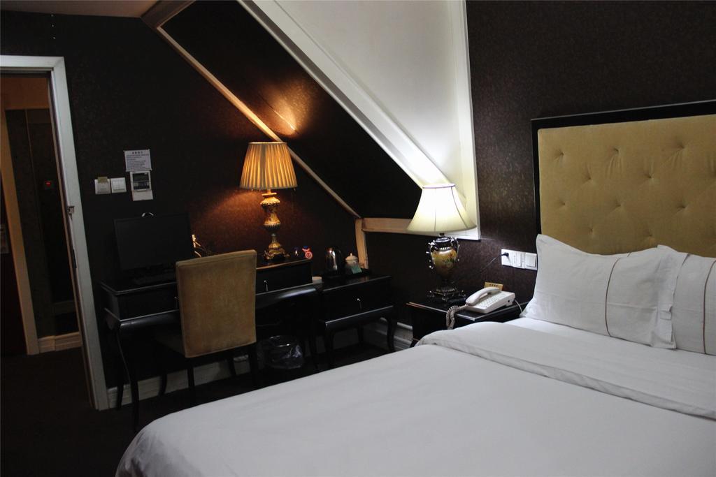 Manhattan Jinling Hotel Shanghái Habitación foto