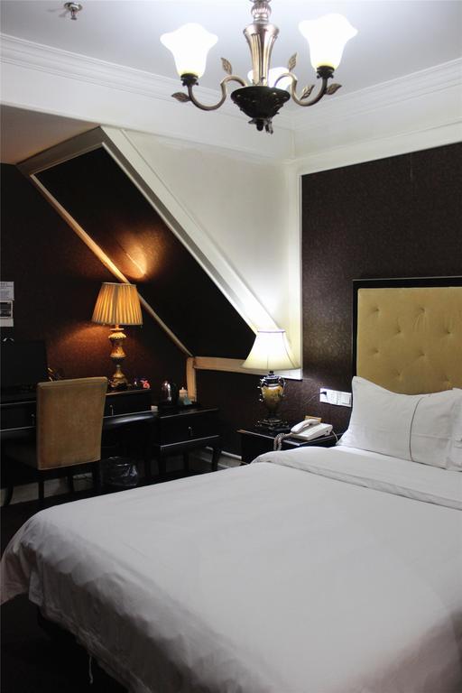 Manhattan Jinling Hotel Shanghái Habitación foto