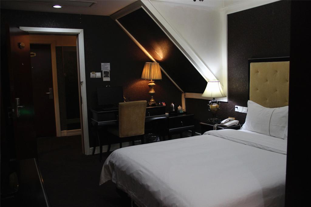 Manhattan Jinling Hotel Shanghái Habitación foto
